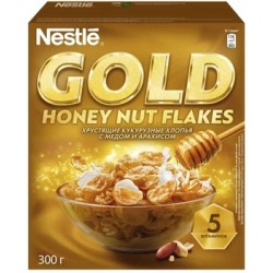 Готовый завтрак Nestle Gold хлопья кукурузные с медом и арахисом 300 гр